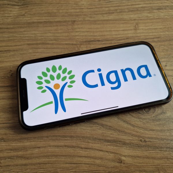 Konskie, Poland - May 20, 2023: Cigna healthcare insurance company logo displayed on mobile phone screen